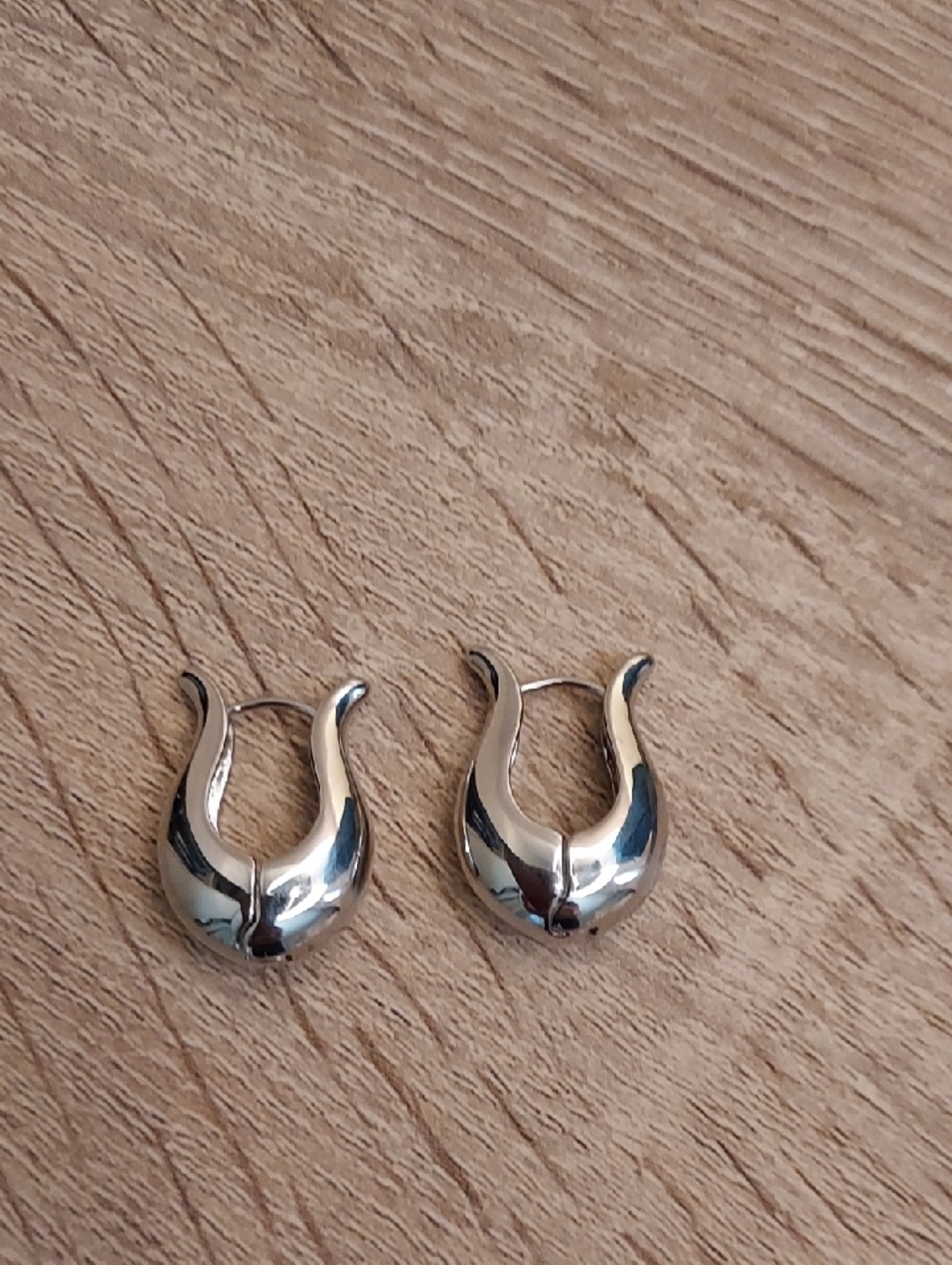 Polished Silver Tone Hoop Earrings - Sculpted Crescent Design
